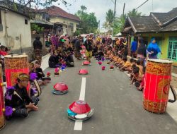 “Resmikan Jalan, Bupati Loteng Disambut Ratusan Dulang Saji Warga Desa Pendem”